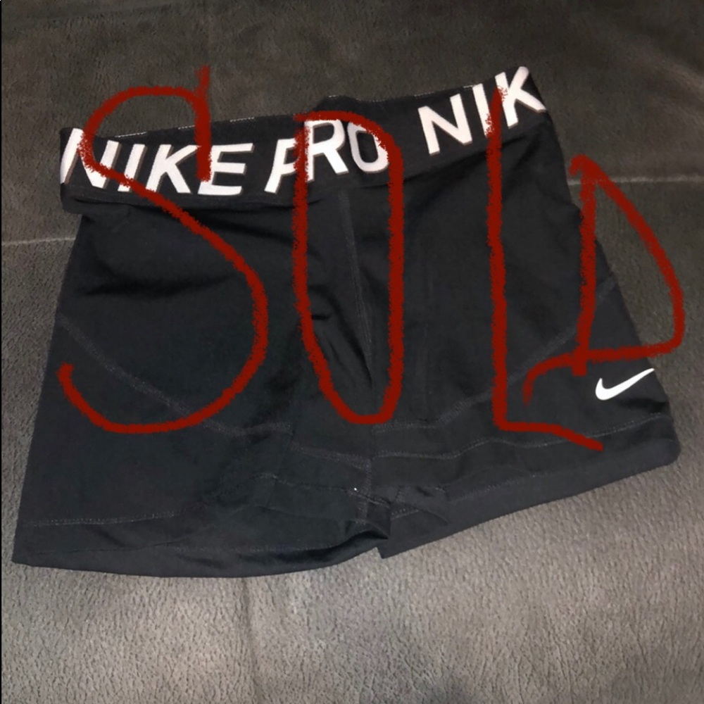 Nike Pro size Medium. Runs small. Black with white swoosh.